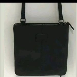 Fossil shoulder strap logo on front . Perfect cond